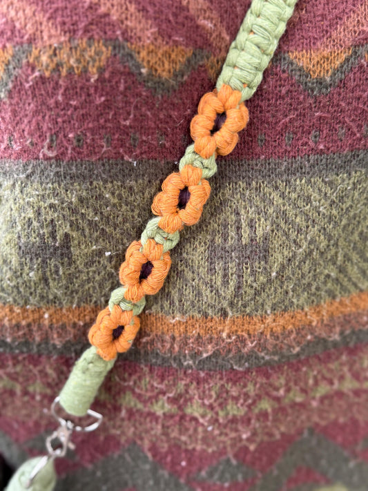 green macrame with yellow and brown sunflower detailing
