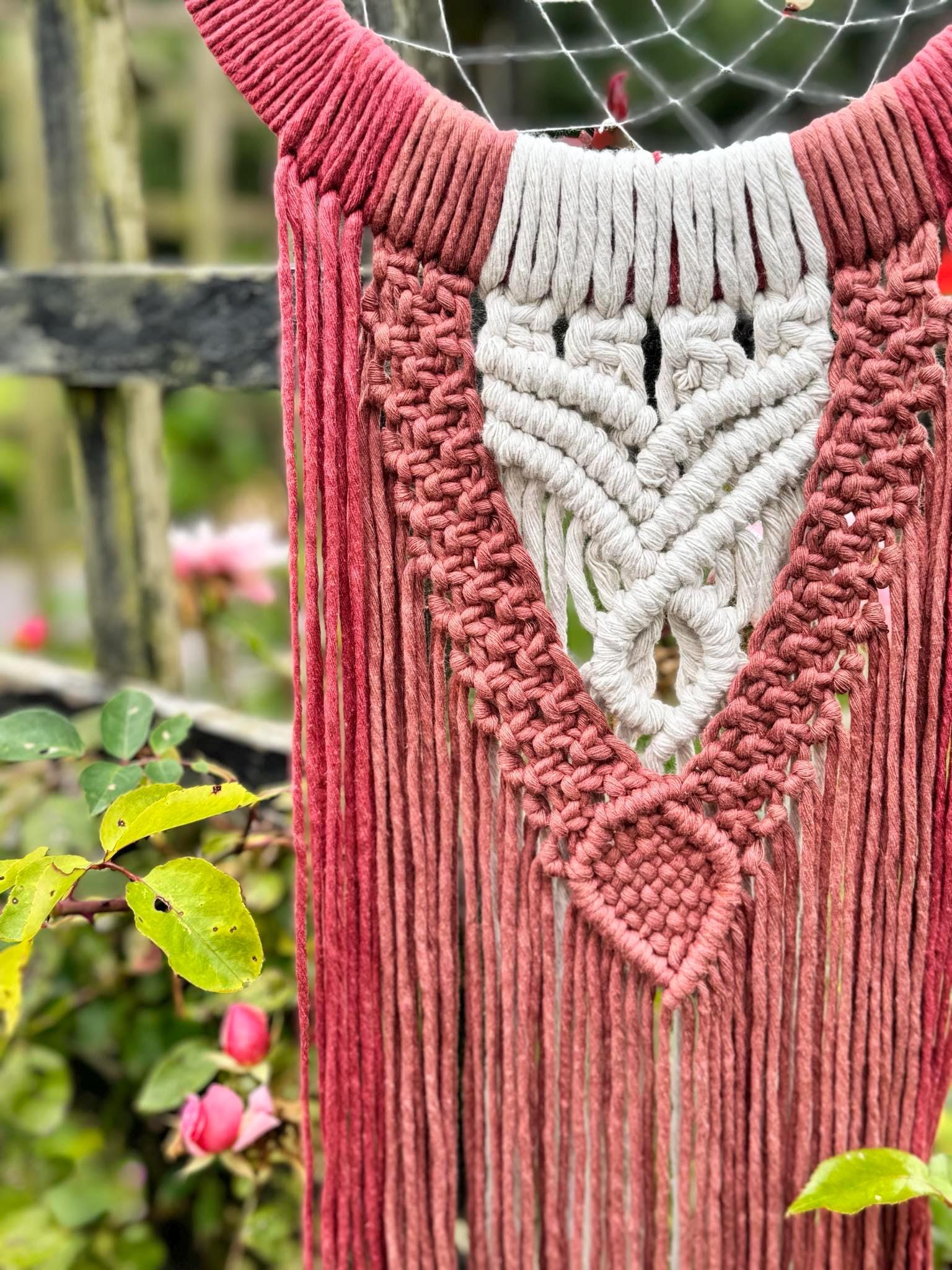 Macrame wall hanging in a garden setting